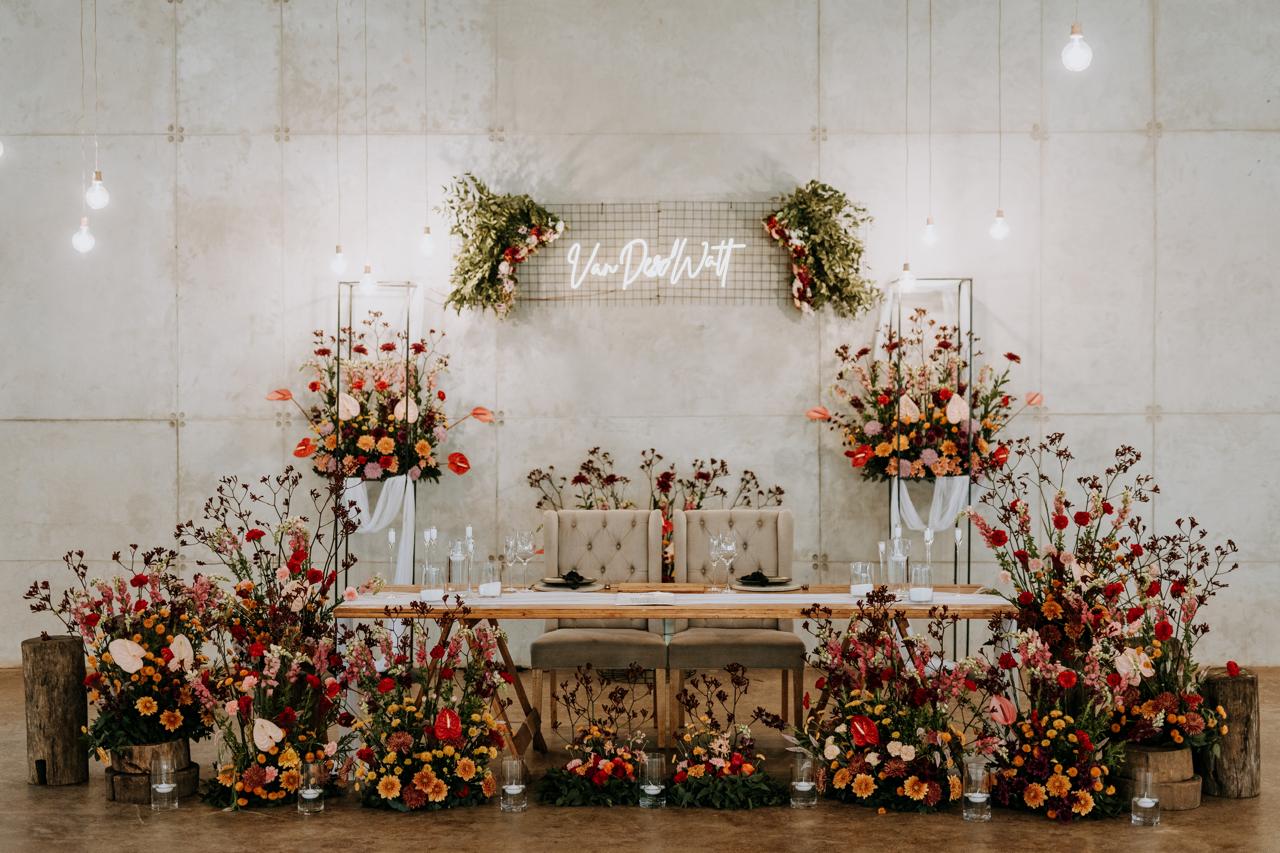 Wedding reception table with floral arrangements